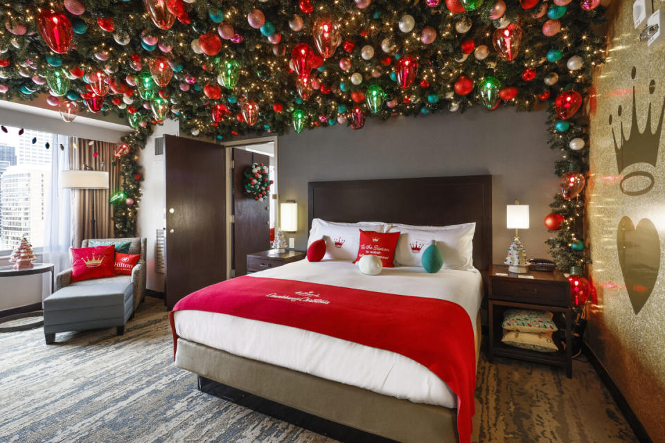Hilton and Hallmark Channel Haul out the Holly Suite at Hilton Americas Houston Bed and Christmas Light Ceiling 2