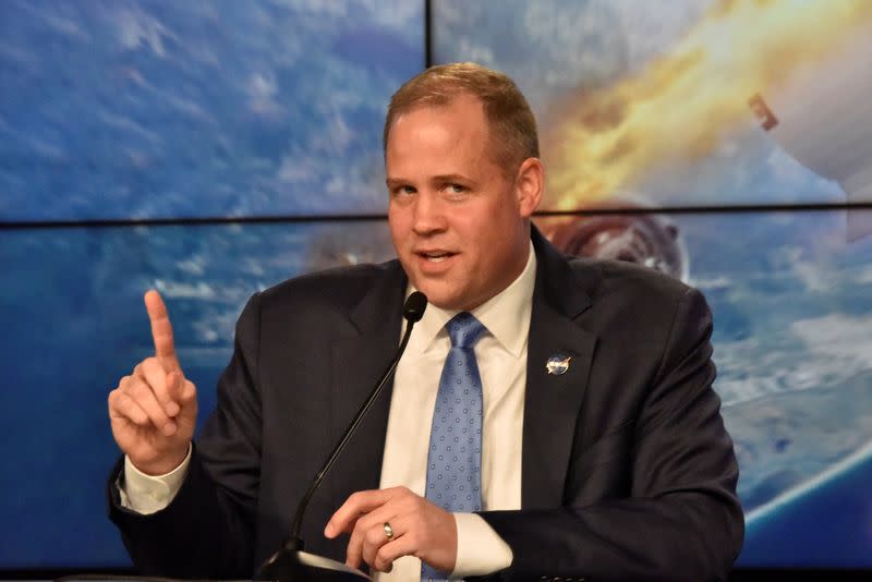FILE PHOTO: NASA Administrator Jim Bridenstine speaks at a post-launch news conference to discuss the SpaceX Crew Dragon astronaut capsule in-flight abort test at the Kennedy Space Center