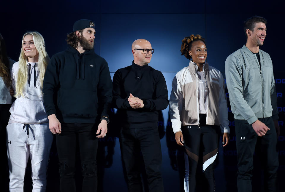 (L-R) US ski champion Lindsey Vonn, Phillies baseball player Bryce Harper, CEO Of Under Armour Patrik Frisk, champion sprinter Natasha Hastings and former record-winning US Olympian swimmer Michael Phelps stand on stage at the 2020 Under Armour Human Performance Summit on January 14, 2020 in Baltimore, Maryland. (Photo by OLIVIER DOULIERY / AFP) (Photo by OLIVIER DOULIERY/AFP via Getty Images)