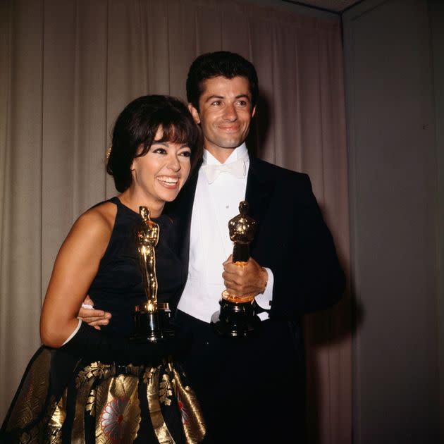 George Chakiris and Moreno are shown as they accept their Academy Awards.