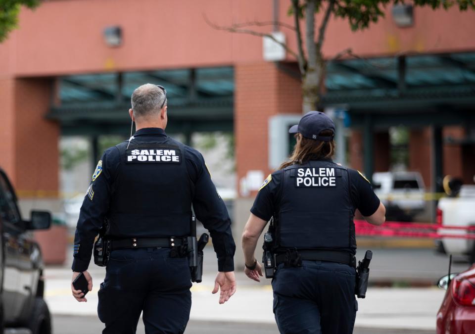 Salem Police respond June 13 to shots fired near the Cherriots Downtown Transit Center at High and Chemeketa streets.