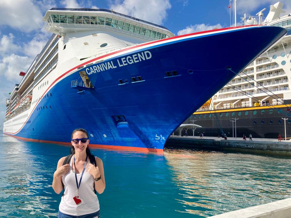 lisa in front of carnival legend