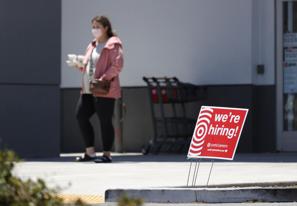 SAUSALITO, CALIFORNIA - JUNE 03: A customer walks by a We&#39;re Hiring sign outside a Target store on June 03, 2021 in Sausalito, California. According to a U.S. Labor Department report, jobless claims fell for a fifth straight week to 385,000. (Photo by Justin Sullivan/Getty Images)