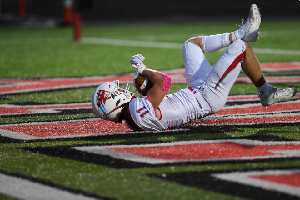 Lincoln's Jack Smith (11) scores a touchdown on Friday, Oct. 6, 2023 at Brandon Valley High School in Brandon, South Dakota.