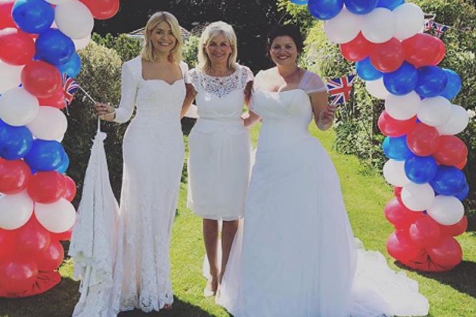 ‘Selfish’ Holly Willoughby accused of stealing limelight from Meghan Markle in wedding dress