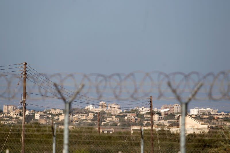 FILE PHOTO: Fenced-in area of Varosha, restricted by the Turkish military is seen from Dherinia checkpoint