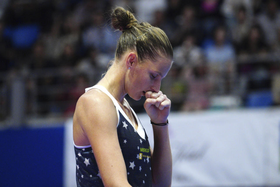 Karolina Pliskova, of Czech Republic reacts after defeating Croatia's Donna Vekic during their semifinal match of the Pan Pacific Open women's tennis tournament in Tokyo Saturday, Sept. 22, 2018. (AP Photo/Eugene Hoshiko)