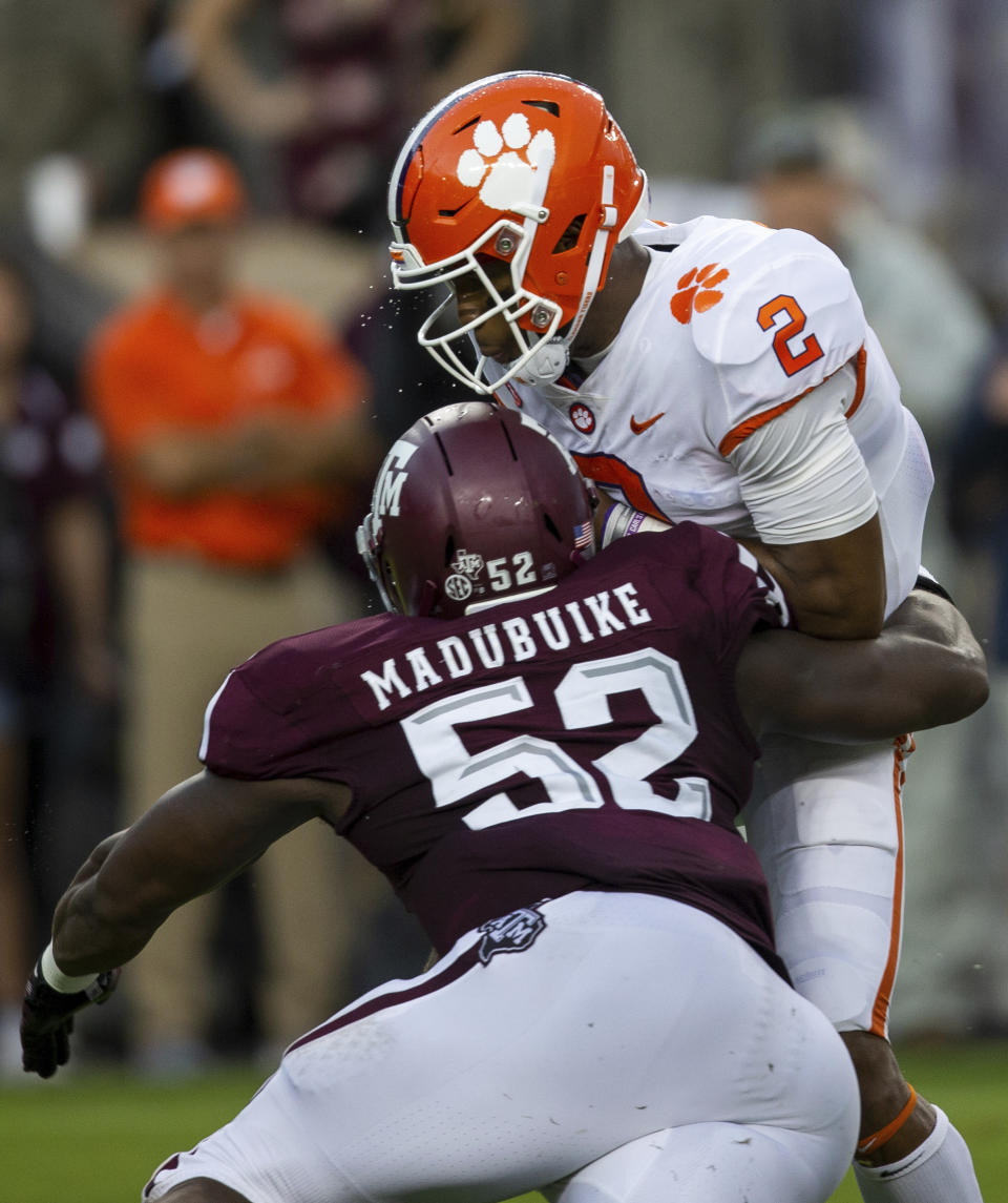 Clemson quarterback Kelly Bryant (2) is sacked by Texas A&M defensive lineman Justin Madubuike (52) during the first quarter of an NCAA college football game Saturday, Sept. 8, 2018, in College Station, Texas. (AP Photo/Sam Craft)