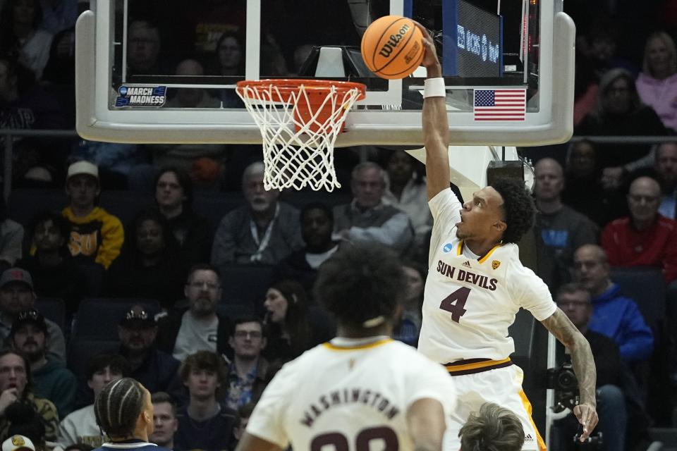 Arizona State's Desmond Cambridge Jr. (4) dunks during the first half of a First Four college basketball game against Nevada in the NCAA men's basketball tournament, Wednesday, March 15, 2023, in Dayton, Ohio. (AP Photo/Darron Cummings)