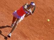 Vitalia Diatchenko of Russia plays a shot to compatriot Maria Sharapova during their women's singles match at the French Open tennis tournament at the Roland Garros stadium in Paris, France, May 27, 2015. REUTERS/Gonzalo Fuentes