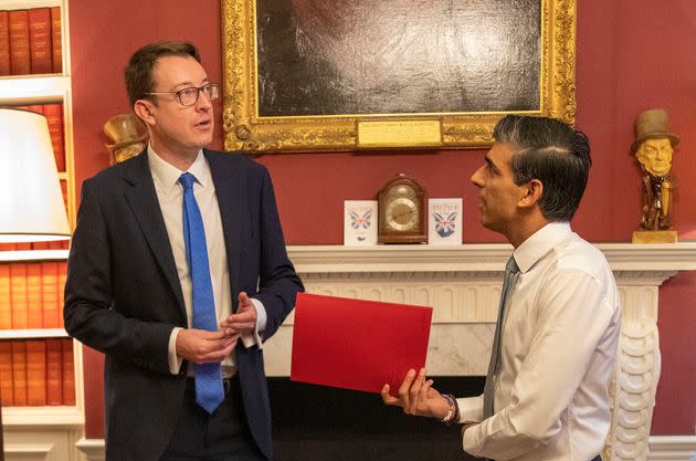 The Chancellor Rishi Sunak and the Chief Secretary to the Treasury Simon Clarke talk through the Budget in the offices of 11 Downing Street last night  (Photo: SIMON WALKER  HM TREASURY)