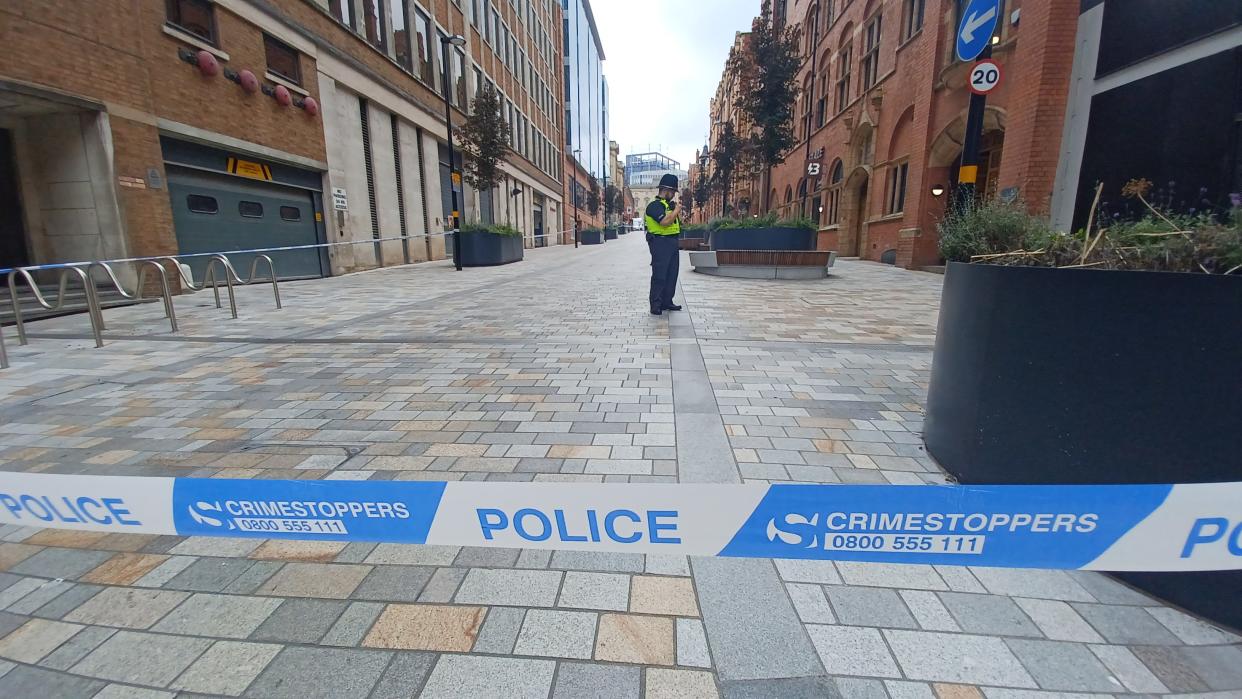 Police sealed off two scenes in Birmingham city centre after a woman was stabbed in an horrific broad daylight attack. (Reach)