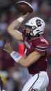 South Carolina quarterback Luke Doty (4) attempts a pass in the first half of an NCAA college football game against Kentucky, Saturday, Sept. 25, 2021, at Williams-Brice Stadium in Columbia, S.C. (AP Photo/Hakim Wright Sr.)