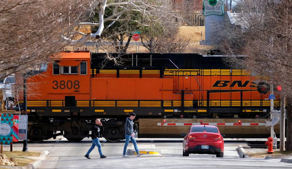 A stopped train blocks the intersection on 9th Street in Automobile Alley. Tuesday, February 15, 2022. 