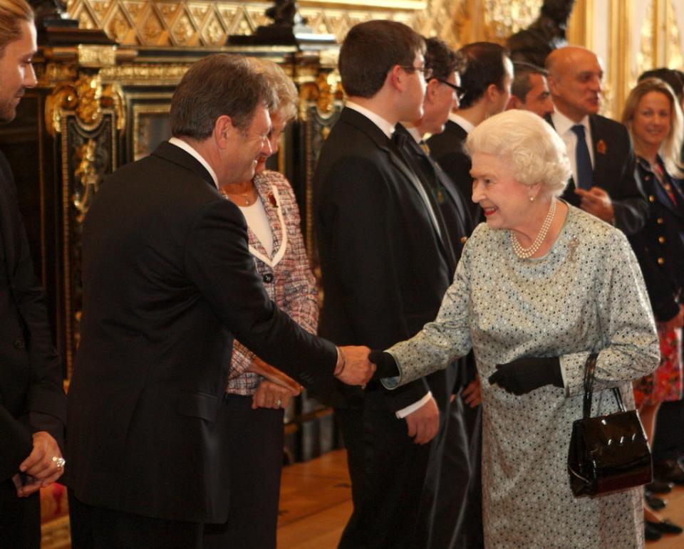 Alan Titchmarsh, pictured with the Queen, is an ambassador for the Queen’s Green Canopy (Steve Parsons/PA) (PA Archive)