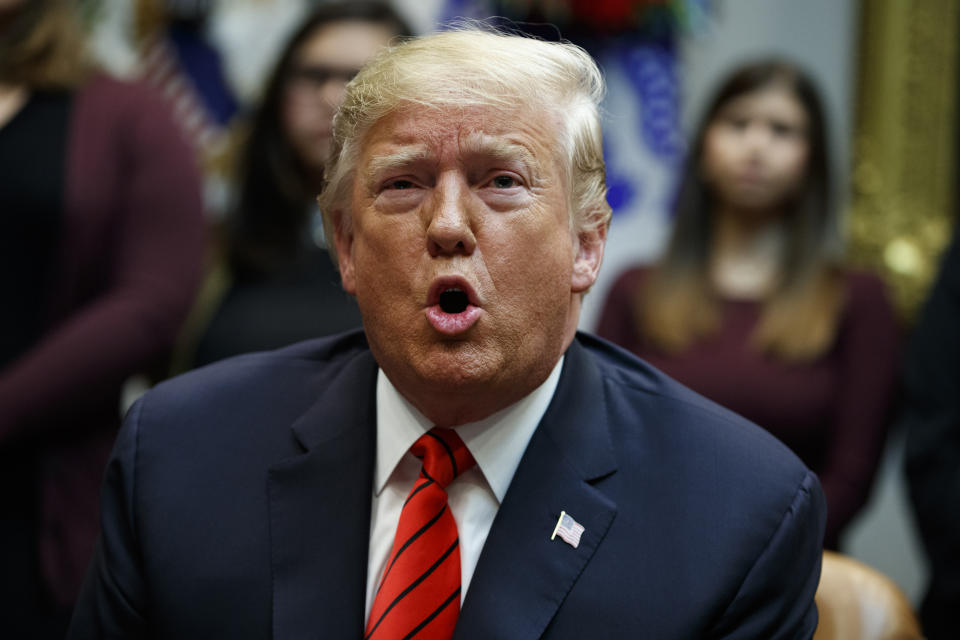 President Donald Trump speaks with astronauts Jessica Meir and Christina Koch as they conduct the first all-female spacewalk, from the Roosevelt Room of the White House, Friday, Oct. 18, 2019, in Washington. (AP Photo/Evan Vucci)