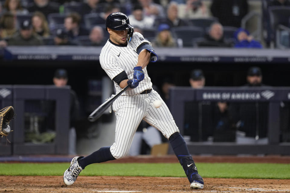 New York Yankees' Giancarlo Stanton hits a solo home run against the Miami Marlins during the sixth inning of a baseball game at Yankee Stadium, Wednesday, April 10, 2024, in New York. (AP Photo/Seth Wenig)