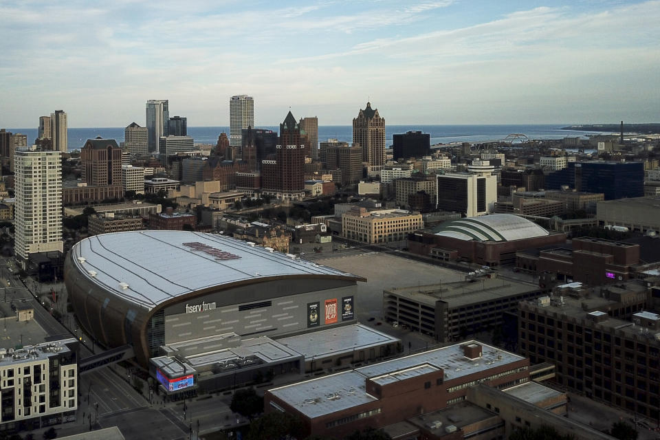 FILE - This July 29, 2020, file photo shows the Fiserv Forum, home of the Milwaukee Bucks NBA basketball team, in Milwaukee. Voting will look a little different this November. NBA owners have pledged to open arenas in Salt Lake City and elsewhere as part of an agreement they made with players to combat racial injustice. (AP Photo/Morry Gash, File)