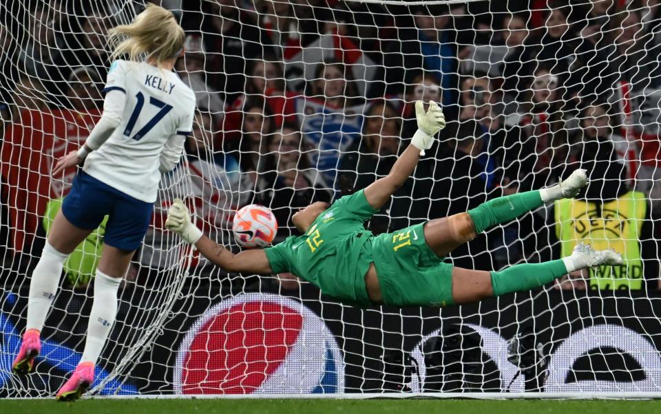 Chloe Kelly scores the winning penalty - AFP/Ben Stansall