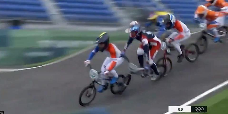 Connor Fields collides with another biker during the BMX event at the Tokyo Olympics.