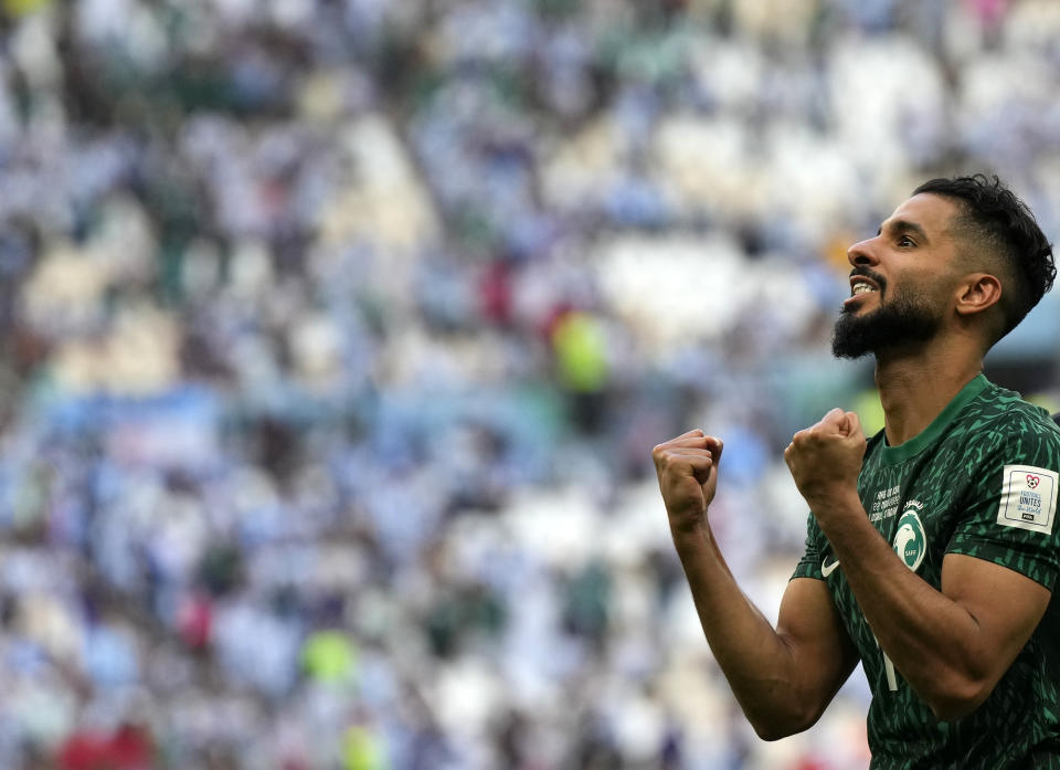 Saudi Arabia's Saleh Al-Shehri celebrates at the end of the World Cup group C soccer match between Argentina and Saudi Arabia at the Lusail Stadium in Lusail, Qatar, Tuesday, Nov. 22, 2022. (AP Photo/Ricardo Mazalan)