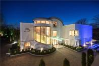 <p>This extravagant home, which has a glass lift in the centre, is on the market for a whopping £40 million. With panoramic views over Hampstead Heath and its own tennis court, indoor swimming pool, spa and home gym, we're not at all surprised it made the most-viewed list. Fancy a peek? It's still on the market...</p><p><a href="https://www.rightmove.co.uk/properties/79055890#/" rel="nofollow noopener" target="_blank" data-ylk="slk:This property is currently on the market for £40,000,000 at Knight Frank via Rightmove.;elm:context_link;itc:0;sec:content-canvas" class="link ">This property is currently on the market for £40,000,000 at Knight Frank via Rightmove.</a> </p>