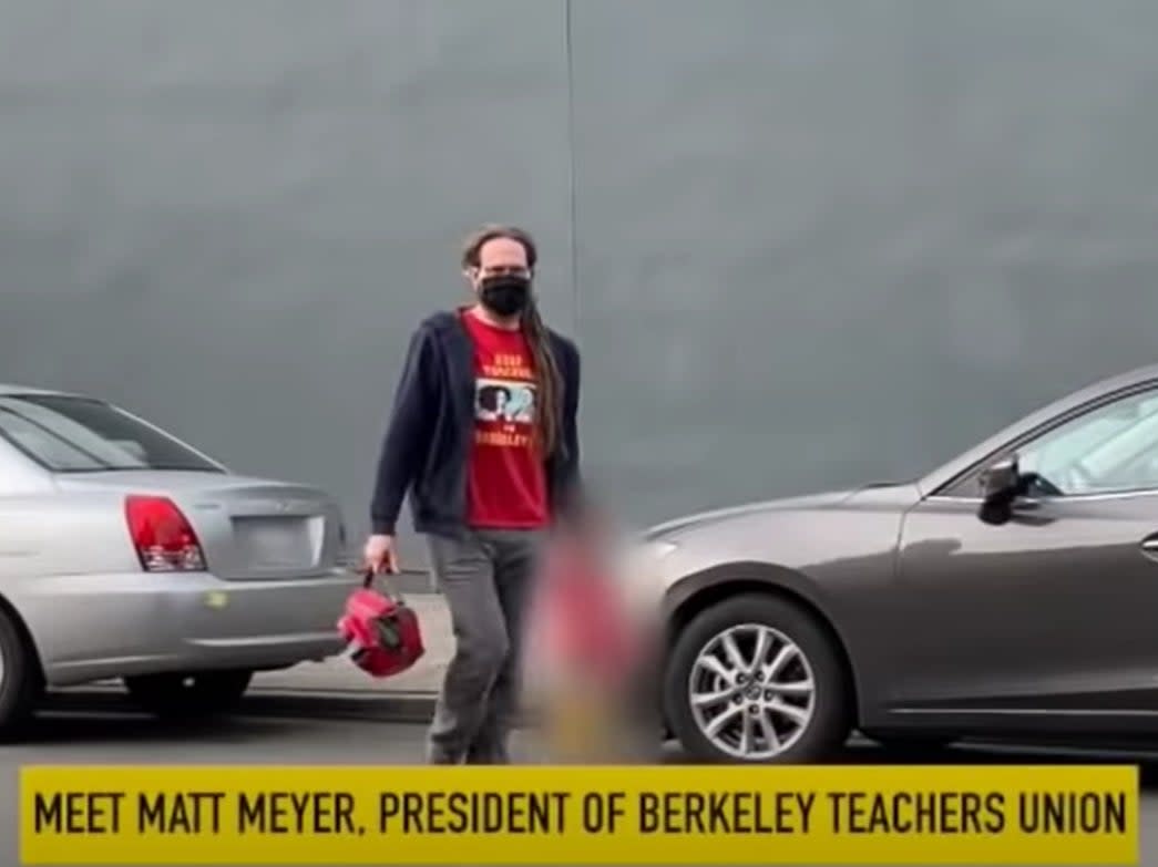 Matt Meyer, head of the Berkeley Federation of Teachers in California, dropping his 2-year-old daughter at a private, in-person pre-schoo (YouTube / @ Guerilla Momz)
