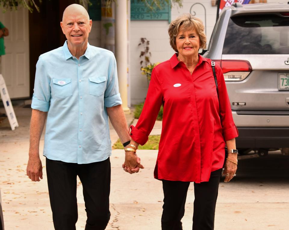 U.S. Rep. Bill Posey and his wife, Katie, exit the Cocoa/Rockledge Garden Club in Rockledge, where they voted Tuesday morning. Posey won an eighth two-year term in Congress, defeating Democrat Joanne Terry in the 8th Congressional District race.