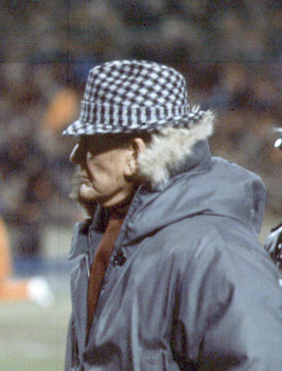 "Bear" Bryant wears his traditional houndstooth hat and a heavy winter coat, which is now part of the display at the Bryant Museum in Tuscaloosa.