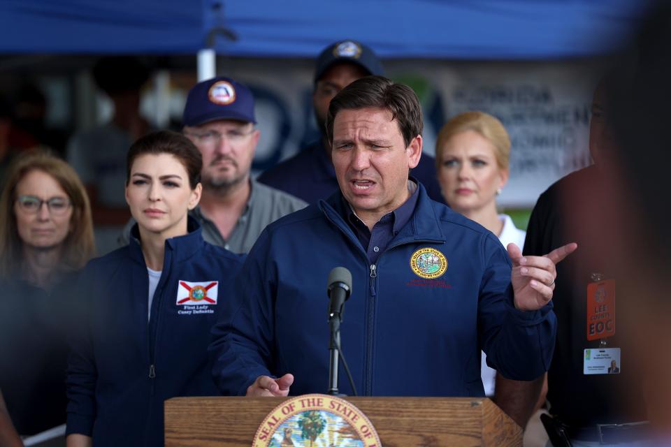 Governor Ron DeSantis speaks during a press conference to update information about the on ongoing efforts to help people after hurricane Ian passed through the area on October 4, 2022 in Cape Coral, Florida.  The hurricane brought high winds, storm surge and rain to the area causing severe damage.