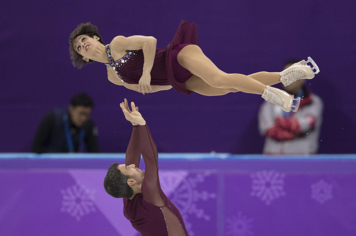 Eric Radford and Meagan Duhamel compete in the pair skating free skating. (Photo: XIN LI via Getty Images)