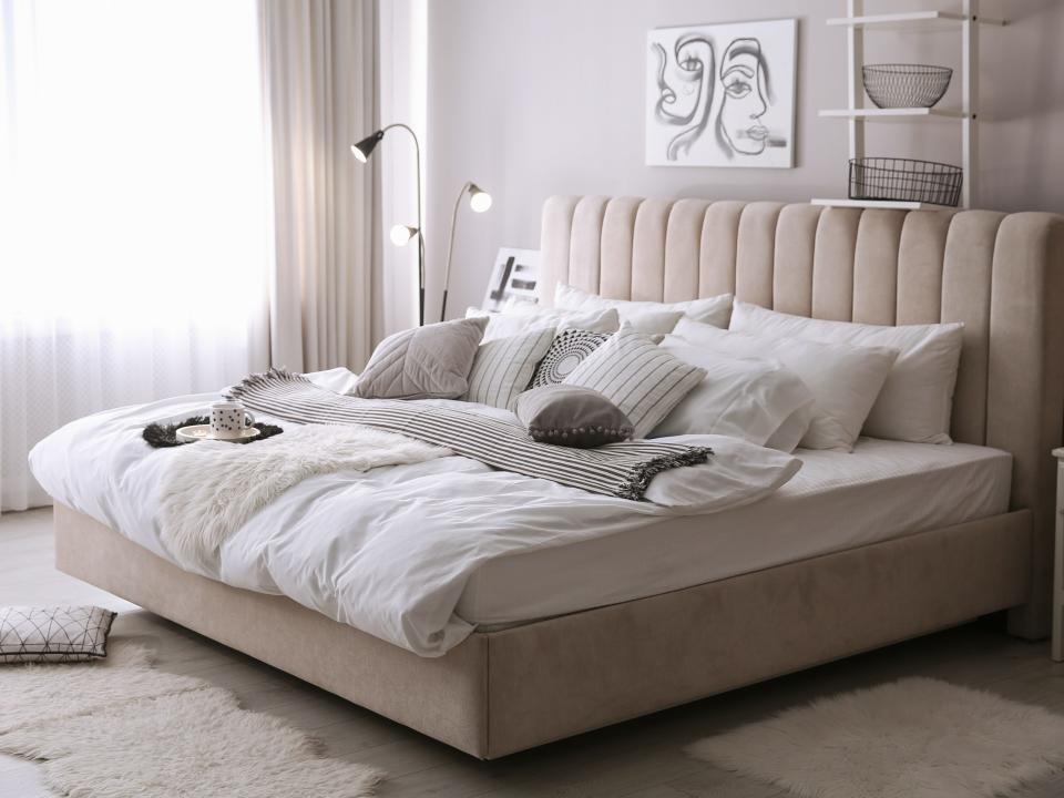 A gray and beige bedroom.