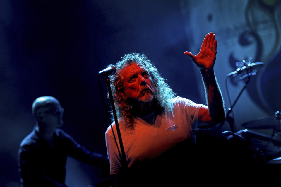 FILE - Robert Plant performs during the Timbre Rock and Roots concert in Singapore, March 21, 2013. Plant turns 74 on Aug. 20. (AP Photo/Wong Maye-E, File)