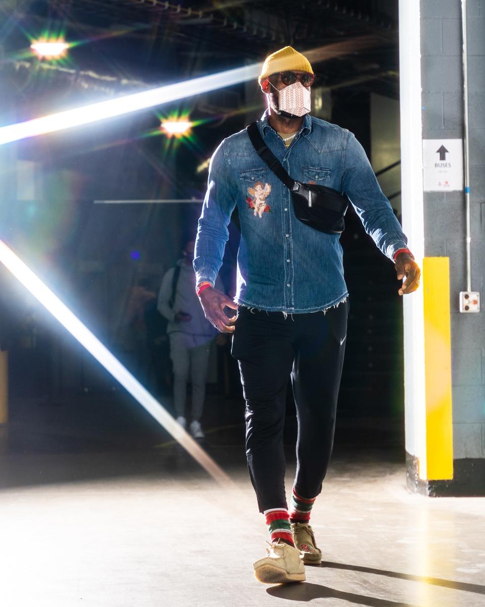 LeBron James of the Los Angeles Lakers arrives for a game against the Rockets, in Houston January 12, 2021.