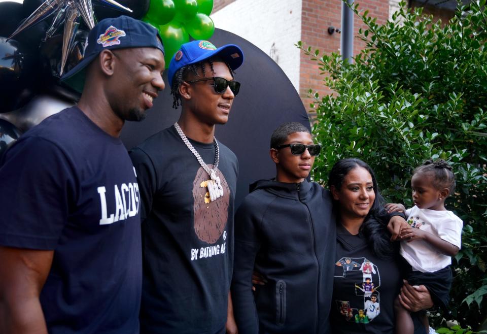 Former RI high schooler, Naeshaun Montgomery (center) poses with her family after he commits to play football with the University of Florida Gators on Sunday evening, August 25, 2024. Left to right are his dad Kashif Montgomery, Naeshaun, brother Junior, mom Natasha Alvarez and sister Chloe.