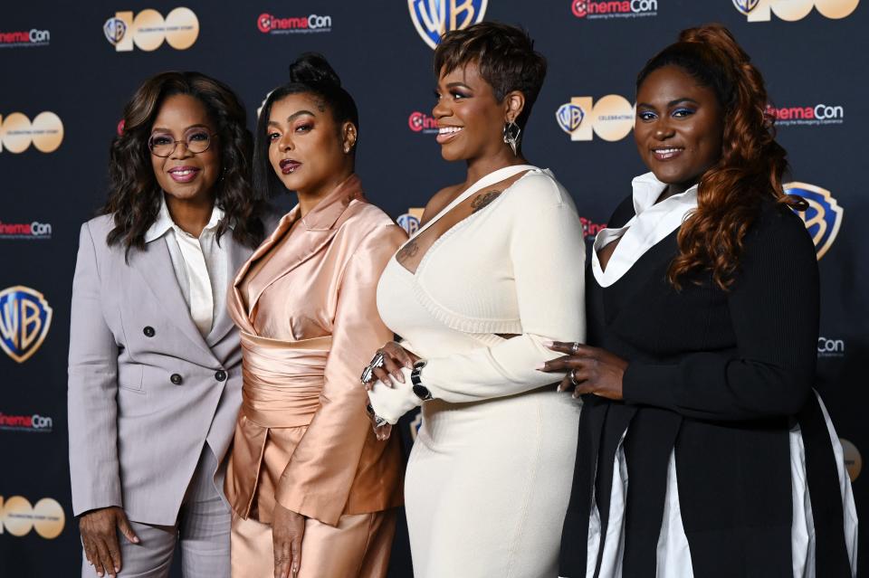 Oprah Winfrey, Taraji P. Henson, Fantasia, Danielle Brooks in front of a CinemaCon step and repeat