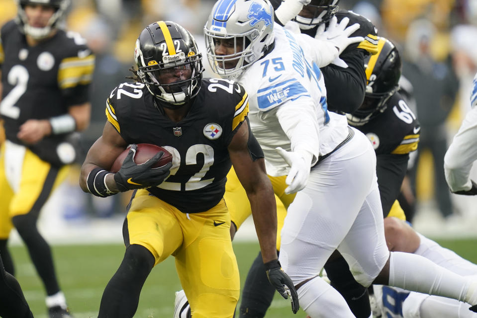 Pittsburgh Steelers running back Najee Harris (22) gets past Detroit Lions defensive tackle Levi Onwuzurike (75) during the first half of an NFL football game, Sunday, Nov. 14, 2021, in Pittsburgh. (AP Photo/Keith Srakocic)