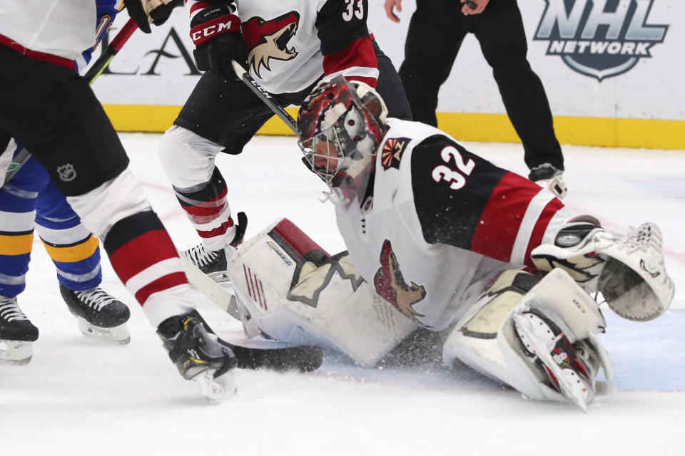 Arizona Coyotes goalie Antti Raanta (32) makes a save against the St. Louis Blues during the second period of an NHL hockey game Thursday, Feb. 20, 2020, in St. Louis. (AP Photo/Dilip Vishwanat)