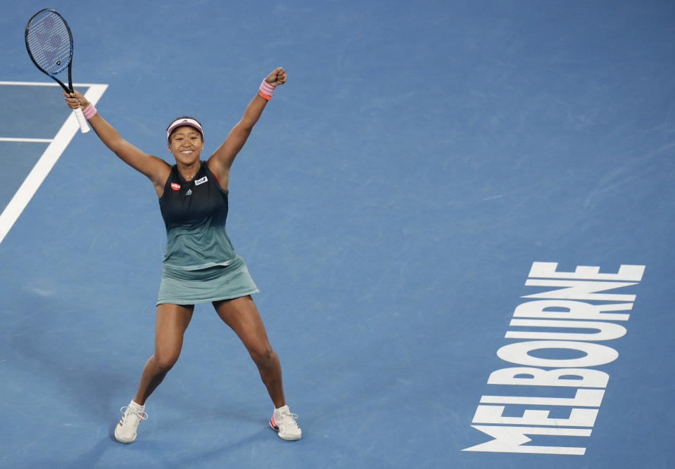 Japan's Naomi Osaka celebrates after defeating Karolina Pliskova of the Czech Republic in their semifinal at the Australian Open tennis championships in Melbourne, Australia, Thursday, Jan. 24, 2019. (AP Photo/Aaron Favila)