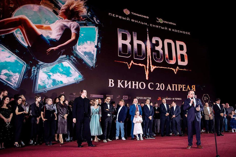 Roscosmos cosmonaut Anton Shkaplerov (at front) joins his fellow cast and film crew members at an April 12, 2023 screening of 