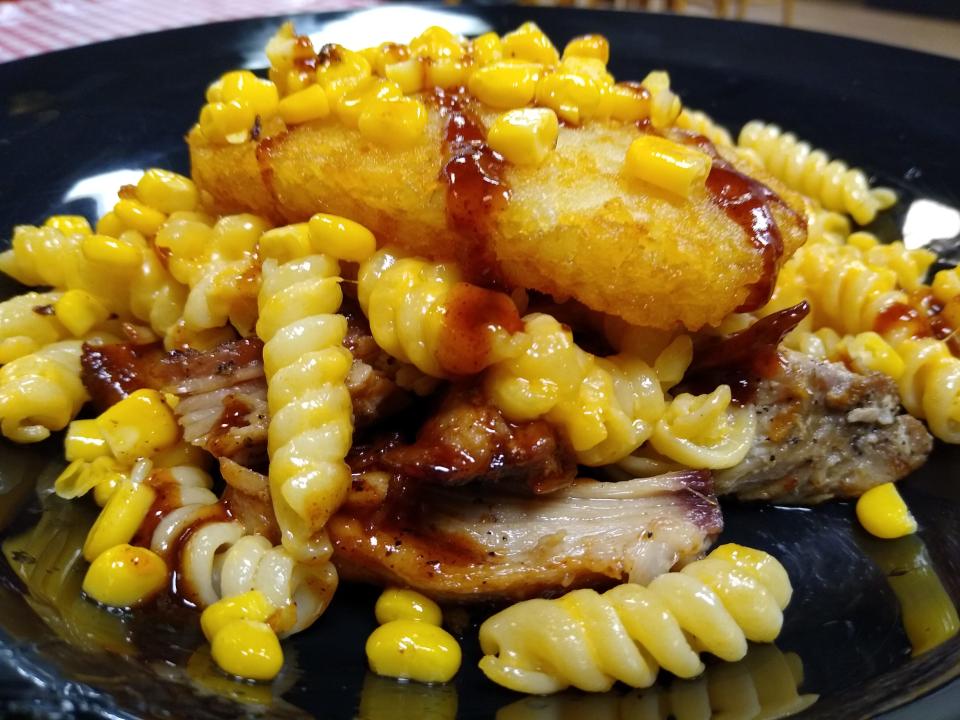 The Slop Bowl at Horseshoe Diner in Ravenna is a combination of pulled pork, rotini mac and cheese, hash browns and corn kernels with barbecue sauce drizzled on top.