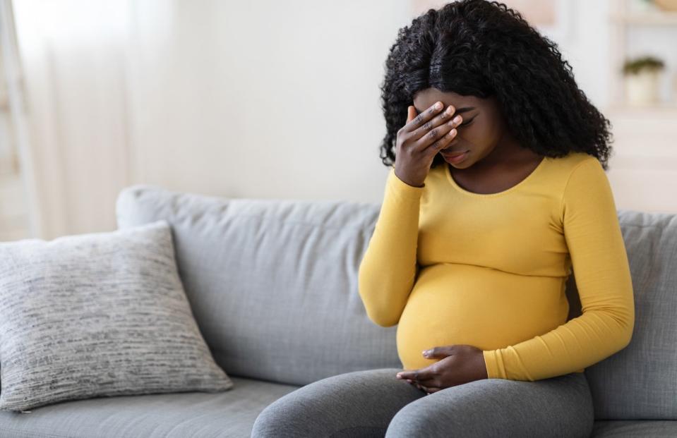 Pregnant woman suffering