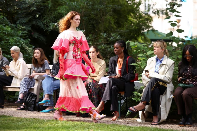 A model presents a creation during the Bora Aksu Spring/Summer 2022 catwalk show at London Fashion Week in London