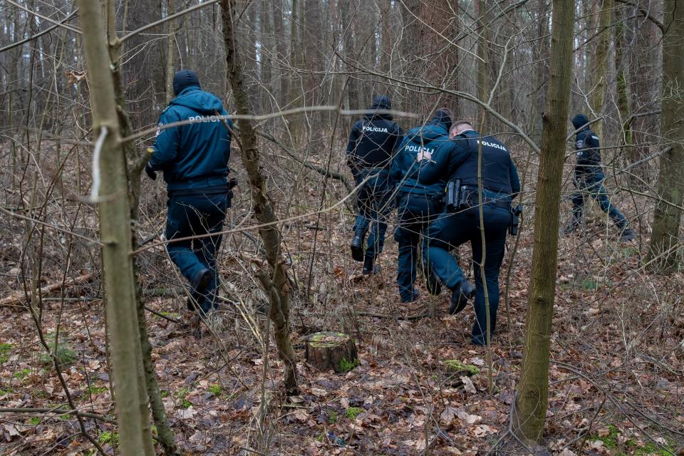Police officers inspect an area near the house of Leonid Volkov, a close associate of the late Russian opposition leader Alexei Navalny, in Vilnius, Lithuania, on March 13, 2024.