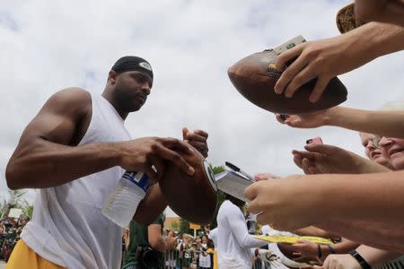 Jul 26, 2018; Ashwaubenon, WI, USA; Green Bay Packers wide receiver Randall Cobb (18) signs autographs after training camp practice at Ray Nitschke Field. Adam Wesley/USA TODAY NETWORK-Wisconsin via USA TODAY NETWORK