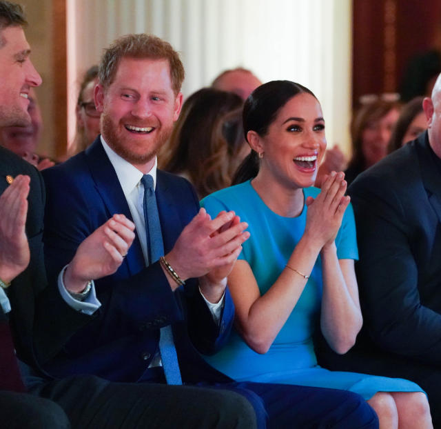 The Duke and Duchess of Sussex cheer during a marriage proposal at the Endeavour Fund Awards at Mansion House in London.