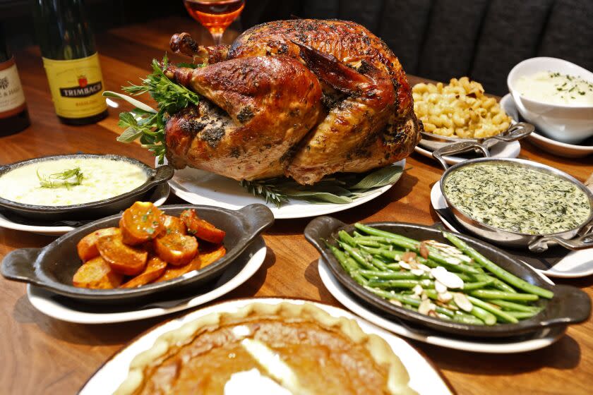 The Old Brea Chop House has a special Thanksgiving takeout dinner, shown here on Tuesday, Nov. 17, 2020. The dinner, which serves four, includes a roasted free-range turkey, candied yams, cranberry relish, pumpkin pie with cinnamon cream, creamed spinach, cavatappi mac and cheese, mashed potatoes, almond string beans, creamed corn, gravy, dinner rolls and roasted pear salad.