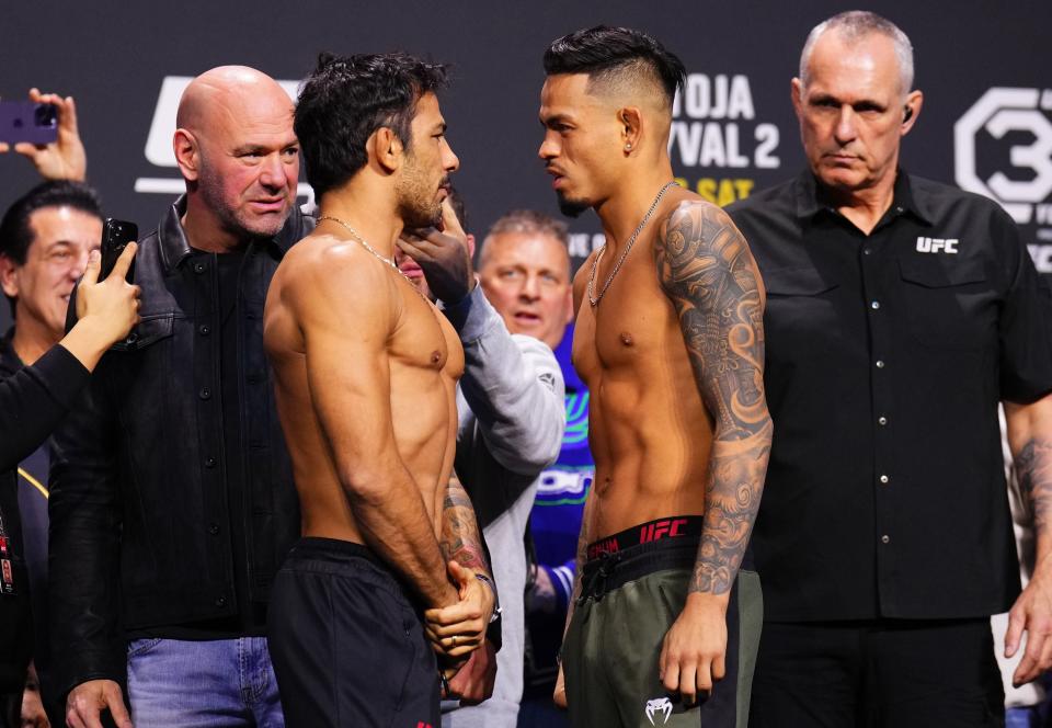 Alexandre Pantoja (centre-left) defends his title against old foe Brandon Royval (Zuffa LLC via Getty Images)