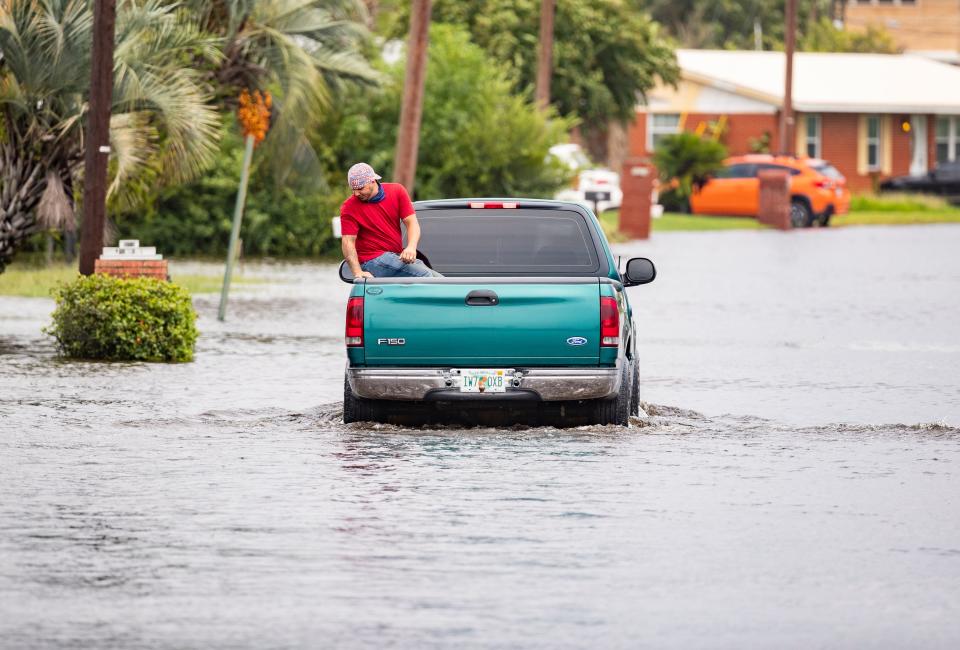 A truck deals with high water on Huntington Drive after heavy rains from Hurricane Ida caused local flooding around Panama City on Aug. 31.