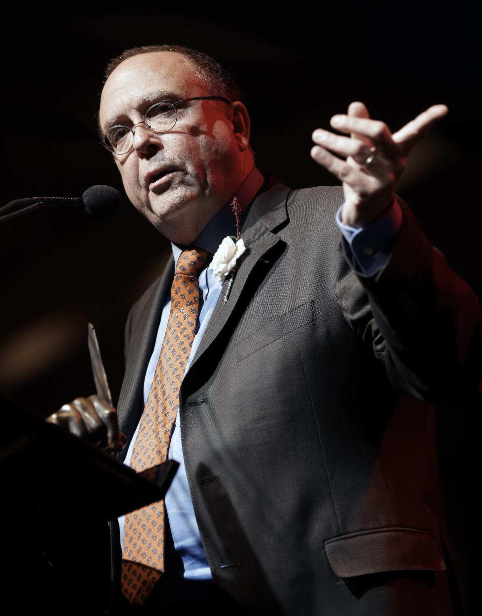 Tony Arata speaks during his induction into the Nashville Songwriters Hall of Fame on Sunday, Oct. 7, 2012, in Nashville, Tenn. (AP Photo/Mark Humphrey)